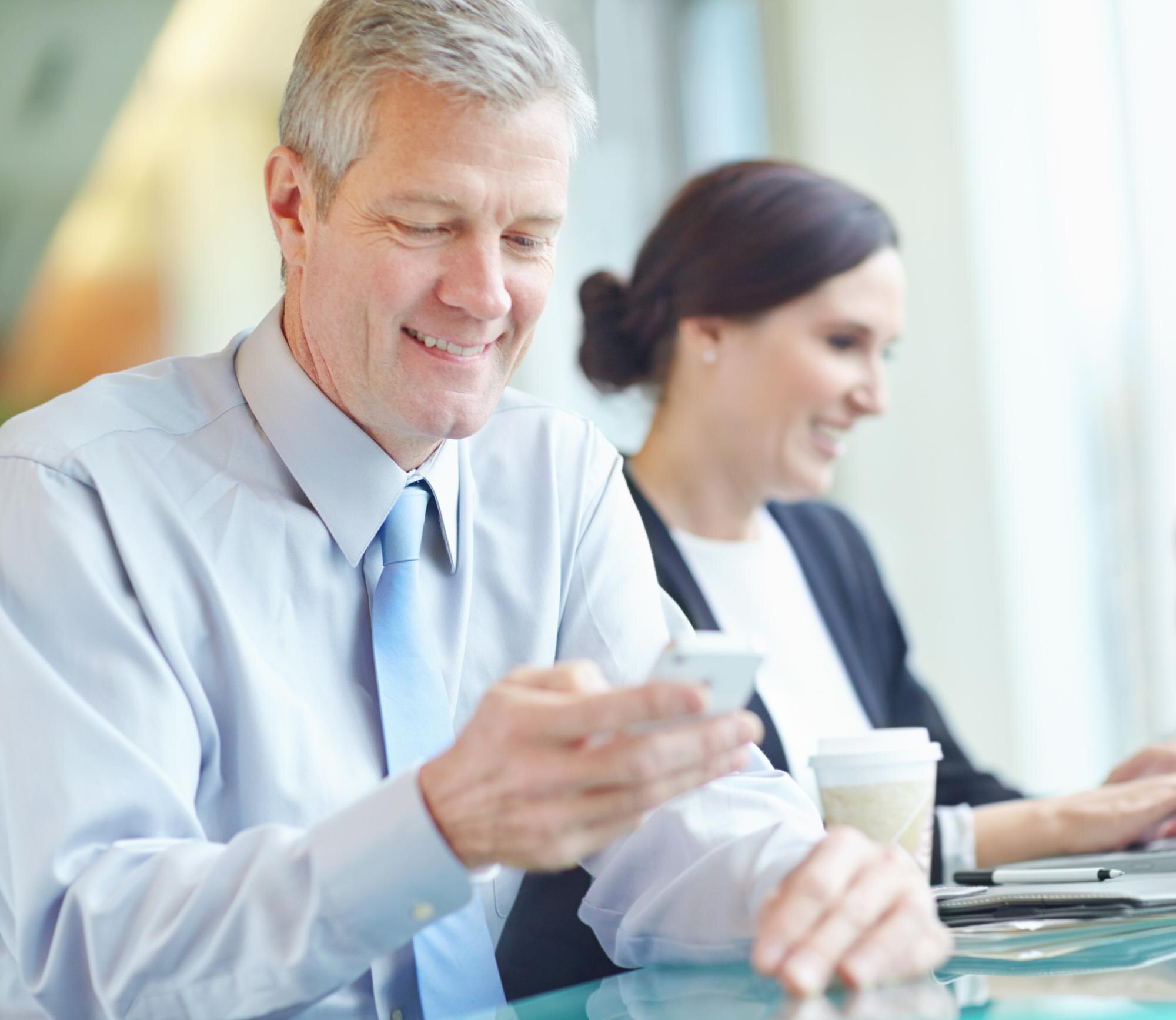 phone happy mature business man reading email update good news investment mobile app financial manag